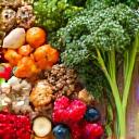 Bowl of fresh, vibrant vegetables and fruits, representing healthy diet and nutrition.